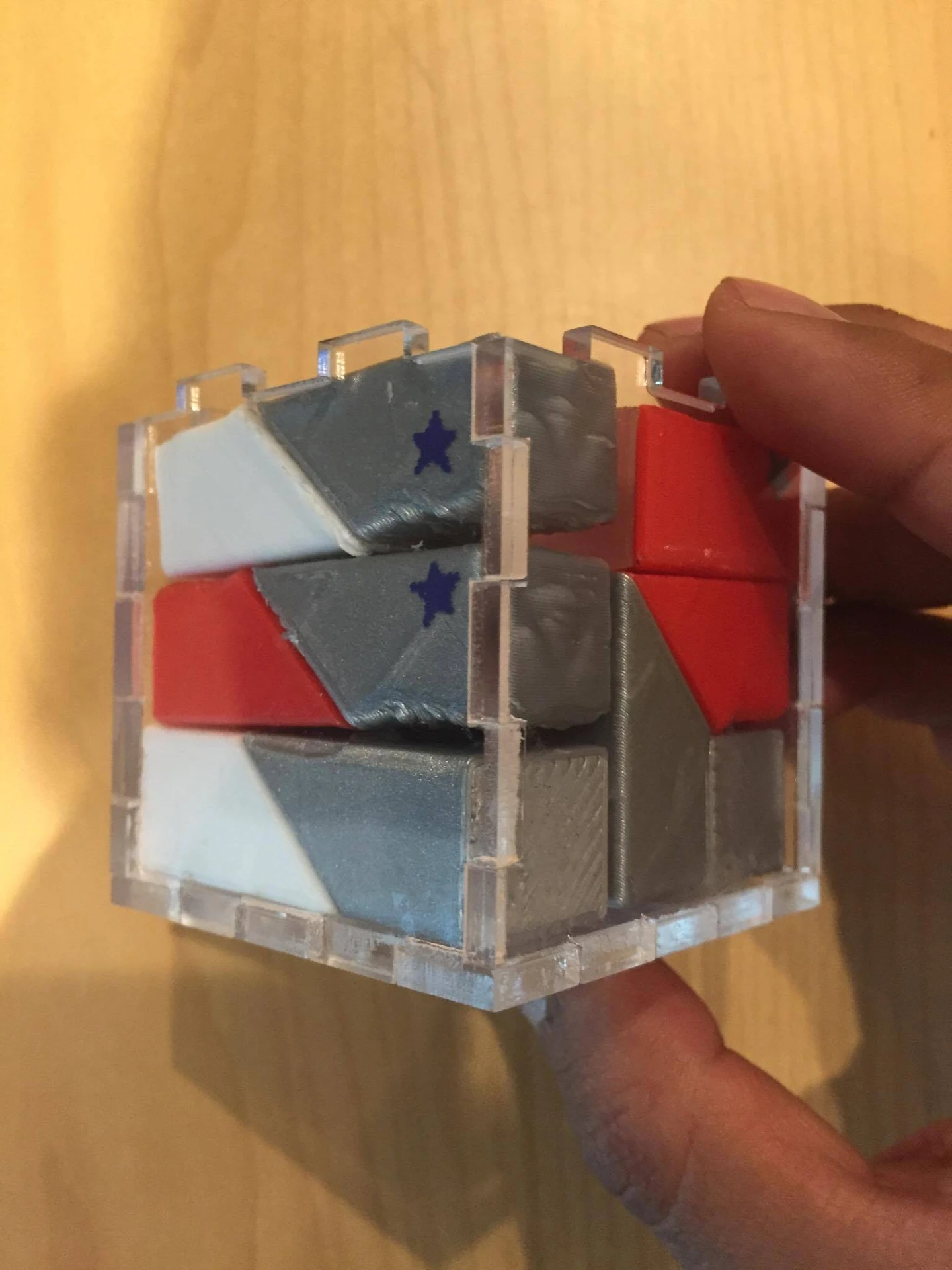 Close-up of a completed cube held in hand