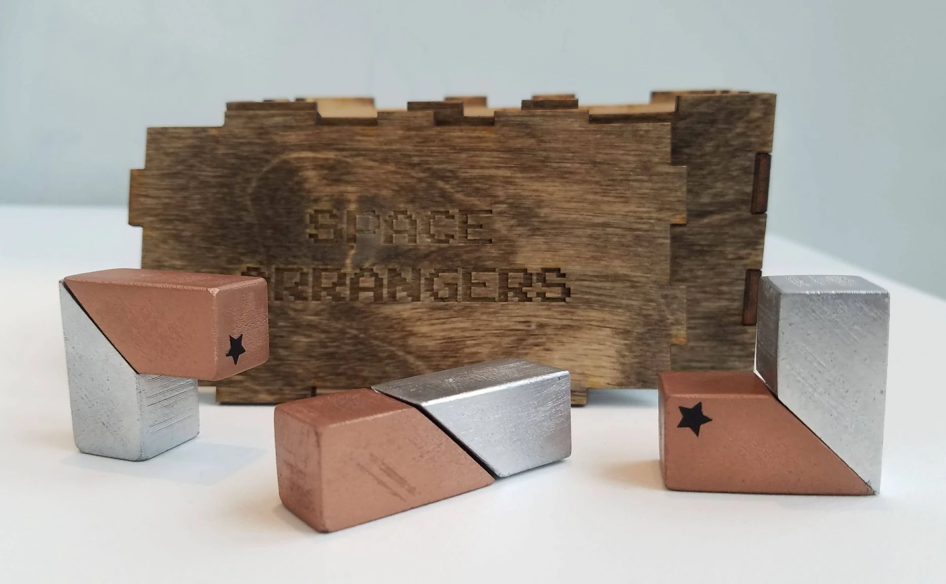 Space Arrangers box and 3D-printed game pieces